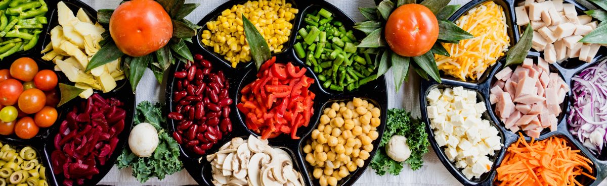 Platter of foods, including vegetables.